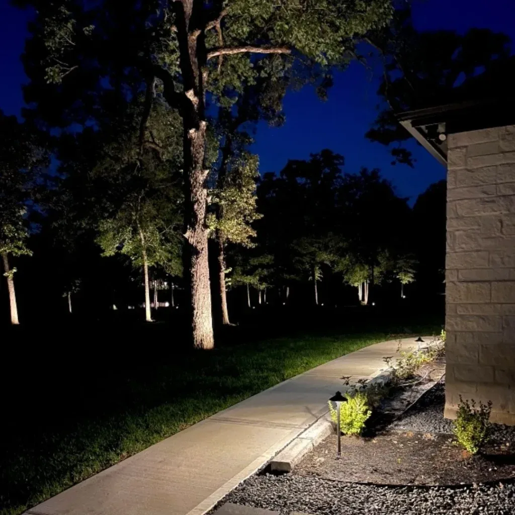 Landscape lighting along the front of a home