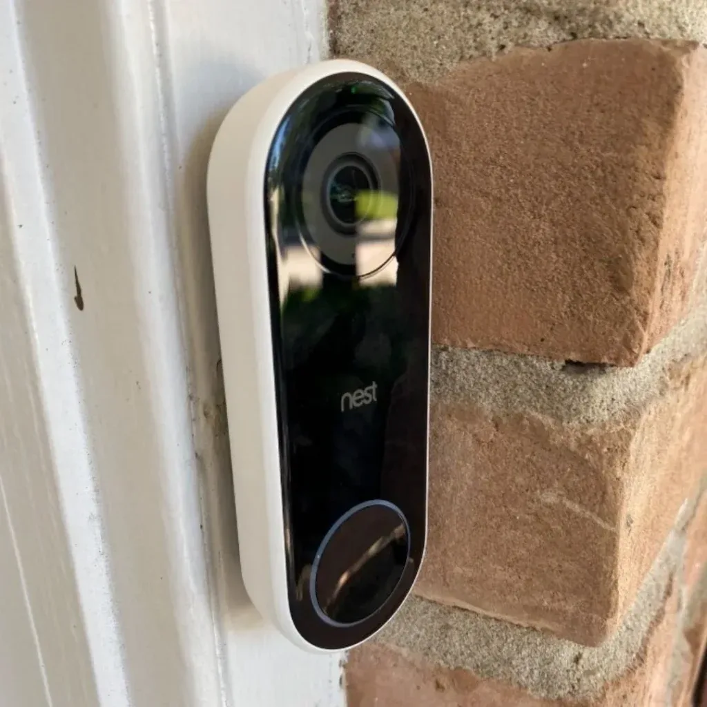 Video doorbell on a stone entry