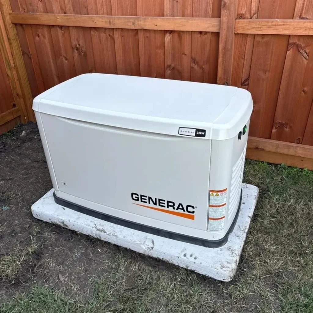 Guardian unit on a poured pad along a wood fence