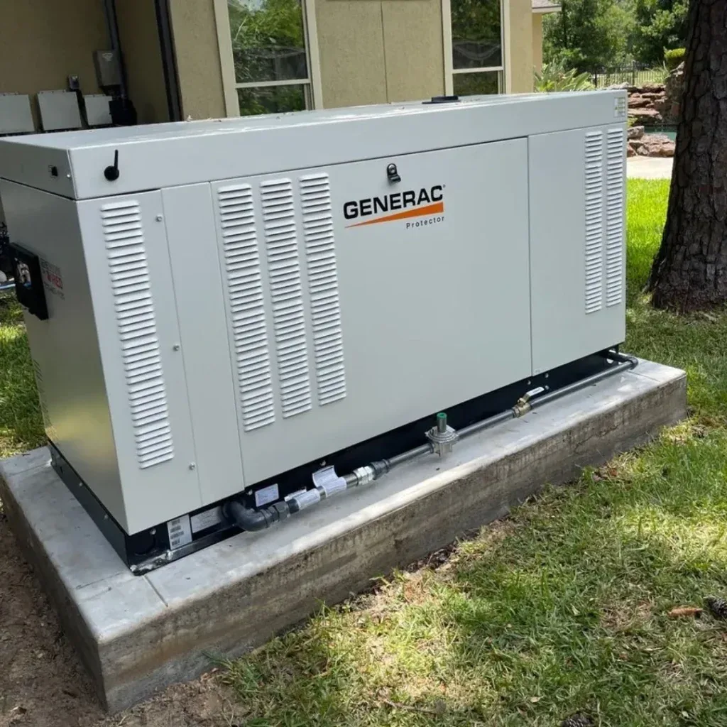 Generac Protector liquid-cooled unit installed on a concrete pad