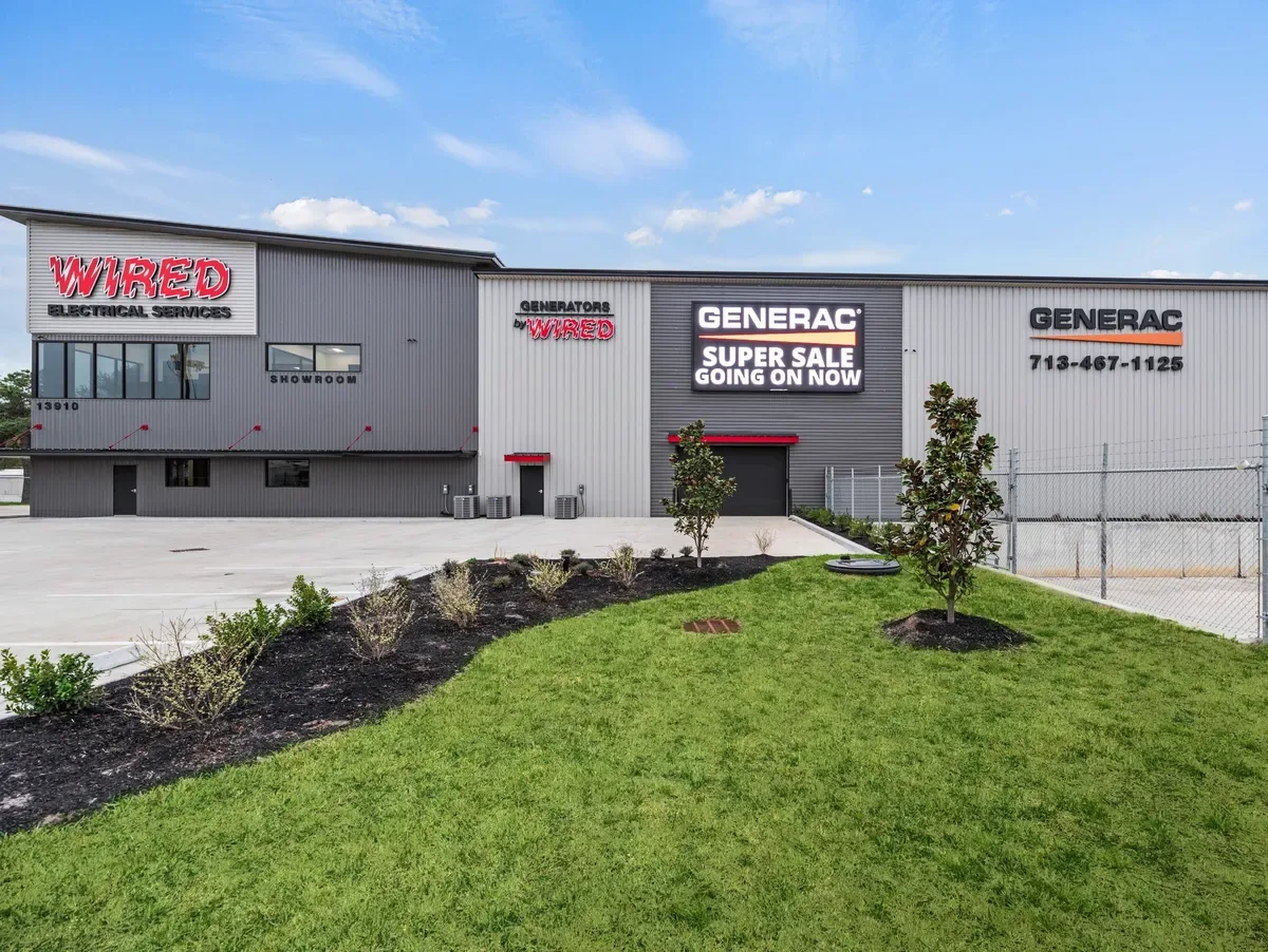 Wired Electrical Services showroom building with Generac signs